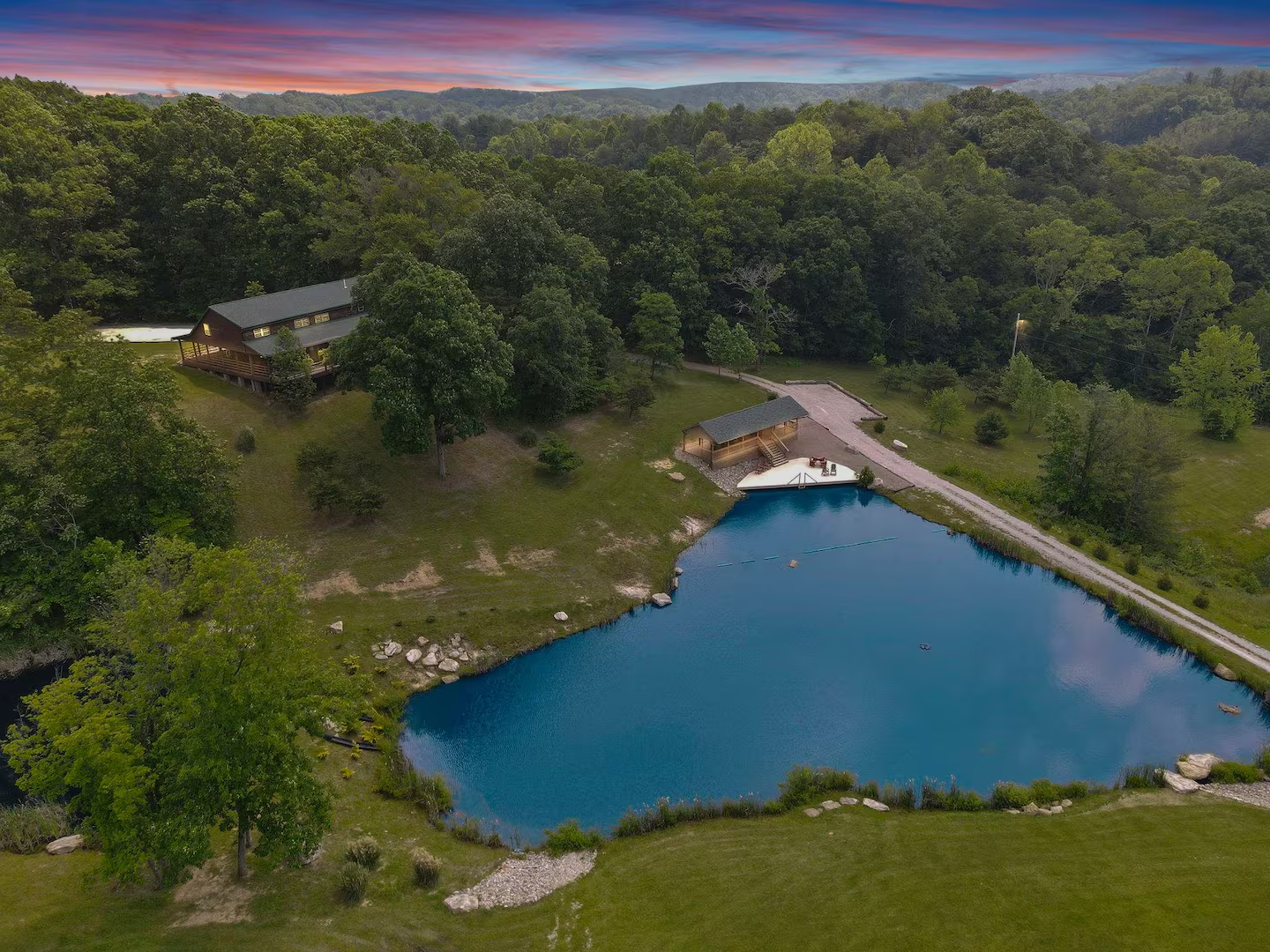 Front exterior of Kodiak Lodge with wraparound deck